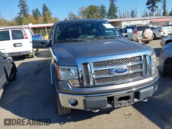 2011 Ford F-150 Lariat with VIN 1FTFW1ET1BFA82757, listed as a IAAI auction lot 43390905 with 128,796 mi miles and . Bid and sale history available at DreamBid. Image 12.