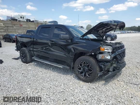 2022 Chevrolet Silverado 1500 Custom with VIN 3GCPYBEK8NG176424, listed as a Copart auction lot 69298705 with 50,729 mi miles and Salvage title. Bid and sale history available at DreamBid. Image 4.