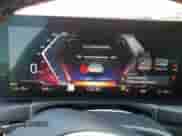 2023 BMW i4 M50 with VIN WBY33AW04PFP87980, listed as a Copart auction lot 84467095 with 6,331 mi miles and Salvage title. Bid and sale history available at DreamBid. Image 9.