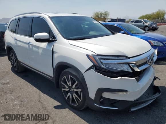 2022 Honda Pilot Touring 7-Passenger с VIN 5FNYF5H64NB020140, выставлен на аукционе Copart как лот 68876195 с пробегом 20 627 миль миль и Списание • Salvage title. История ставок и продаж доступна на DreamBid. Изображение 4.