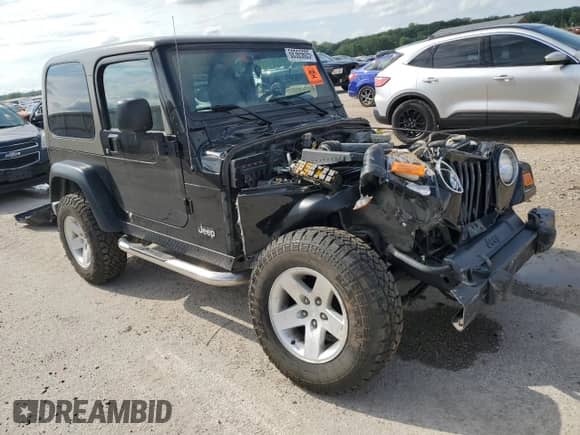 2005 Jeep Wrangler Rubicon with VIN 1J4FA69S75P371177, listed as a Copart auction lot 68365605 with Not provided miles and Salvage title. Bid and sale history available at DreamBid. Image 4.