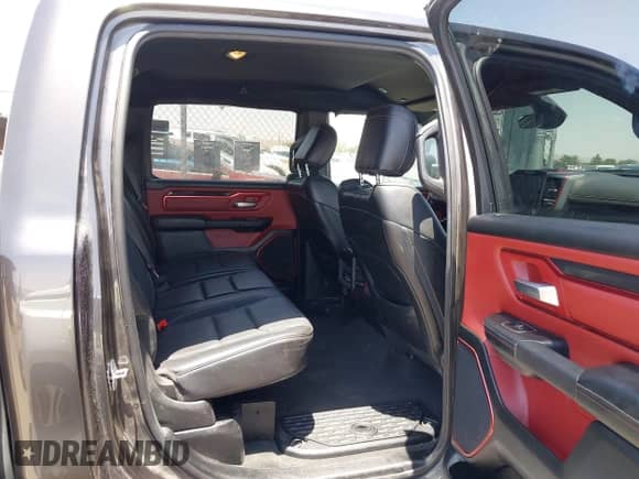 2020 Ram 1500 Rebel with VIN 1C6SRFLT1LN398728, listed as a IAAI auction lot 42526369 with 85,040 mi miles and . Bid and sale history available at DreamBid. Image 8.