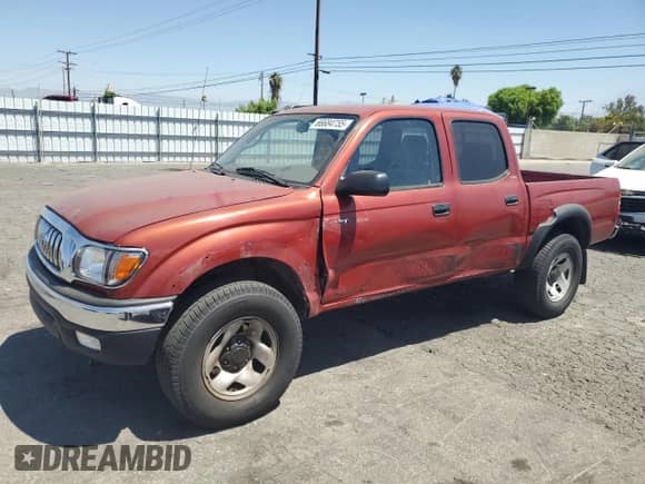 2002 Toyota Tacoma PreRunner z VIN 5TEGM92N62Z118802, wystawiony jako Copart lot #66684755 z przebiegiem 216 147 mil mil oraz Szkoda całkowita • Salvage title. Historia ofert i sprzedaży dostępna na DreamBid. Obrazek 1.