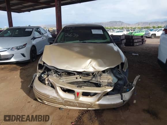 2001 Pontiac Grand Am SE z VIN 1G2NE52T81M582634, wystawiony jako IAAI lot #42652160 z przebiegiem Nie podano mil oraz . Historia ofert i sprzedaży dostępna na DreamBid. Obrazek 6.