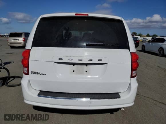2014 Dodge Grand Caravan SE with VIN 2C4RDGBG7ER338426, listed as a Copart auction lot 56259495 with 209,322 mi miles and Salvage title. Bid and sale history available at DreamBid. Image 6.