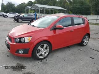 2012 Chevrolet Sonic LTZ with VIN 1G1JE6SH7C4162547, listed as a Copart auction lot 59697225 with 112,332 mi miles and Clean title. Bid and sale history available at DreamBid. Image 1.