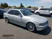 2000 BMW 5 Series 528i с VIN WBADM6345YGU19775, выставлен на аукционе Copart как лот 66575655 с пробегом 216 624 миль миль и Списание • Salvage title. История ставок и продаж доступна на DreamBid. Изображение 4.