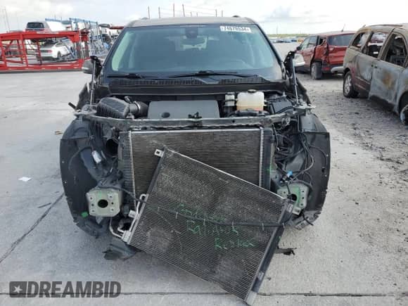 2020 Chevrolet Traverse LT Cloth z VIN 1GNERMKWXLJ224533, wystawiony jako Copart lot #74676534 z przebiegiem 151 121 mil mil oraz Szkoda całkowita • Salvage title. Historia ofert i sprzedaży dostępna na DreamBid. Obrazek 5.