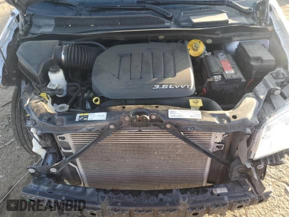 2018 Dodge Grand Caravan SE Plus с VIN 2C4RDGBG3JR190771, выставлен на аукционе Copart как лот 82398495 с пробегом 68 650 миль миль и Списание • Salvage title. История ставок и продаж доступна на DreamBid. Изображение 12.