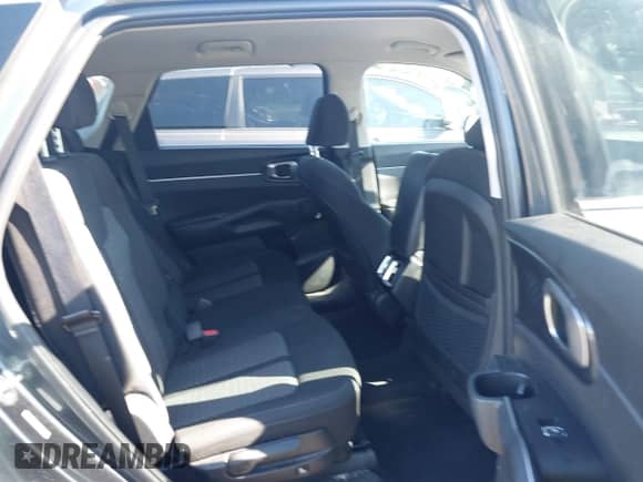 2023 Kia Sorento LX with VIN 5XYRGDLC1PG163051, listed as a IAAI auction lot 43135002 with 69,670 mi miles and . Bid and sale history available at DreamBid. Image 8.