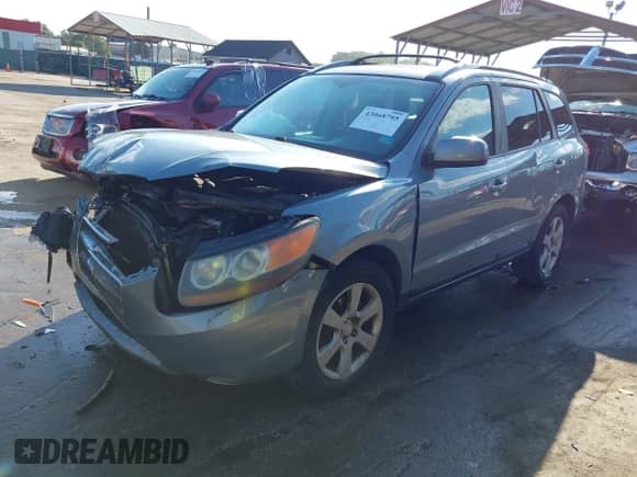 2007 Hyundai Santa Fe SE z VIN 5NMSH73E07H032197, wystawiony jako IAAI lot #43068795 z przebiegiem 166 632 mil mil oraz . Historia ofert i sprzedaży dostępna na DreamBid. Obrazek 17.