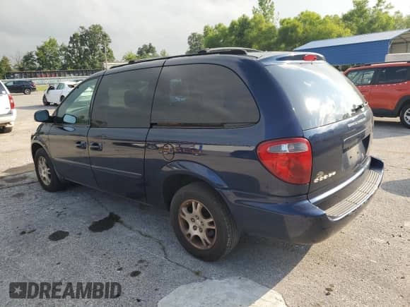2004 Dodge Caravan SXT with VIN 2D4GP44L74R509426, listed as a Copart auction lot 67239555 with 184,165 mi miles and Salvage title. Bid and sale history available at DreamBid. Image 2.