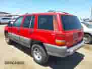 1996 Jeep Grand Cherokee Laredo z VIN 1J4GZ58Y5TC183677, wystawiony jako IAAI lot #42582989 z przebiegiem 187 453 mil mil oraz . Historia ofert i sprzedaży dostępna na DreamBid. Obrazek 3.