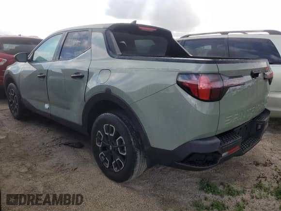 2022 Hyundai Santa Cruz SEL z VIN 5NTJB4AE9NH036216, wystawiony jako Copart lot #78818104 z przebiegiem 12 248 mil mil oraz Nie do naprawy • Non repairable. Historia ofert i sprzedaży dostępna na DreamBid. Obrazek 2.