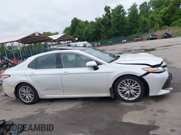 2019 Toyota Camry SE z VIN 4T1B11HK5KU720581, wystawiony jako IAAI lot #42300818 z przebiegiem 136 779 mil mil oraz . Historia ofert i sprzedaży dostępna na DreamBid. Obrazek 13.