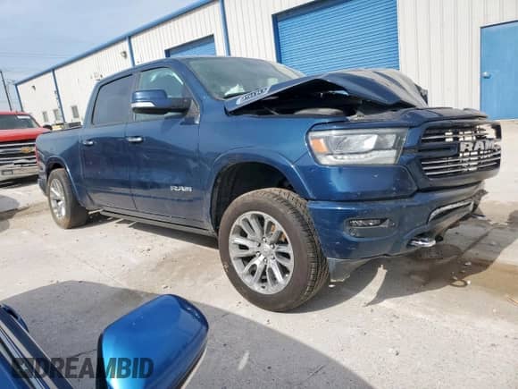 2021 Ram 1500 Laramie with VIN 1C6RREJT1MN625056, listed as a Copart auction lot 56871585 with Not provided miles and Salvage title. Bid and sale history available at DreamBid. Image 4.