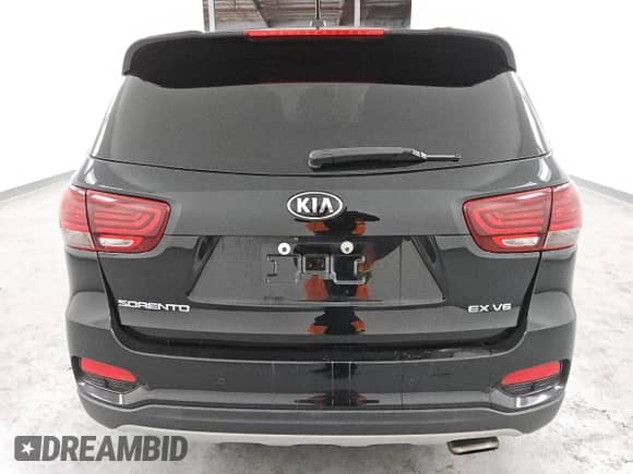 2019 Kia Sorento EX Sport с VIN 5XYPH4A56KG600625, выставлен на аукционе Copart как лот 49332895 с пробегом 83 140 миль миль и Чистый • Clean title. История ставок и продаж доступна на DreamBid. Изображение 6.
