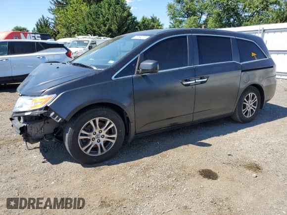 2013 Honda Odyssey EX с VIN 5FNRL5H41DB001667, выставлен на аукционе Copart как лот 70164215 с пробегом 260 658 миль миль и Списание • Salvage title. История ставок и продаж доступна на DreamBid. Изображение 1.