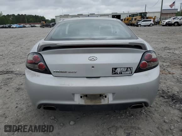 2008 Hyundai Tiburon GS с VIN KMHHM66DX8U288114, выставлен на аукционе Copart как лот 51866995 с пробегом Не указан миль и Списание • Salvage title. История ставок и продаж доступна на DreamBid. Изображение 6.