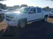 2016 Chevrolet Silverado 1500 LT z VIN 3GCUKREC5GG276375, wystawiony jako IAAI lot #43577857 z przebiegiem 125 238 mil mil oraz . Historia ofert i sprzedaży dostępna na DreamBid. Obrazek 2.
