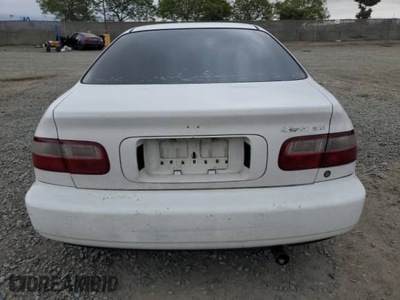 1993 Honda Civic z VIN 1HGEJ1163PL022628, wystawiony jako Copart lot #56114855 z przebiegiem 243 656 mil mil oraz Szkoda całkowita • Salvage title. Historia ofert i sprzedaży dostępna na DreamBid. Obrazek 6.