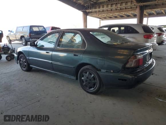 1996 Honda Accord LX z VIN 1HGCD5639TA073934, wystawiony jako Copart lot #80319165 z przebiegiem 218 970 mil mil oraz Szkoda całkowita • Salvage title. Historia ofert i sprzedaży dostępna na DreamBid. Obrazek 2.