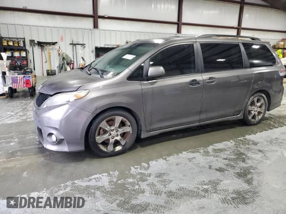 2012 Toyota Sienna SE with VIN 5TDXK3DC0CS227169, listed as a Copart auction lot 68631155 with 309,068 mi miles and Clean title. Bid and sale history available at DreamBid. Image 1.