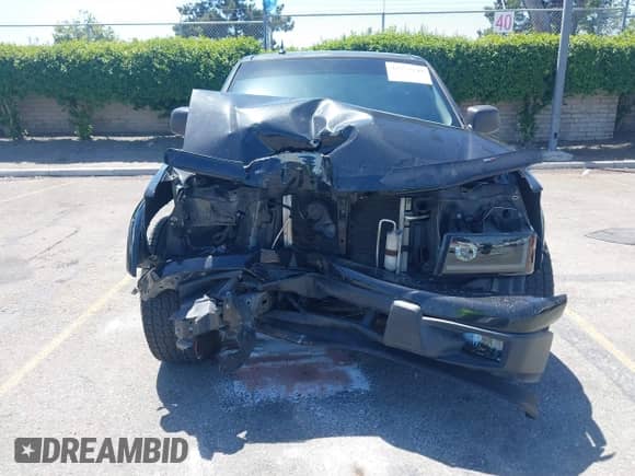 2008 Chevrolet Colorado z VIN 1GCDT299X88223620, wystawiony jako IAAI lot #42273149 z przebiegiem 180 015 mil mil oraz . Historia ofert i sprzedaży dostępna na DreamBid. Obrazek 13.