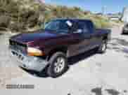 2004 Dodge Dakota SLT z VIN 1D7HG42N24S691756, wystawiony jako Copart lot #68787765 z przebiegiem 142 437 mil mil oraz Szkoda całkowita • Salvage title. Historia ofert i sprzedaży dostępna na DreamBid. Obrazek 1.