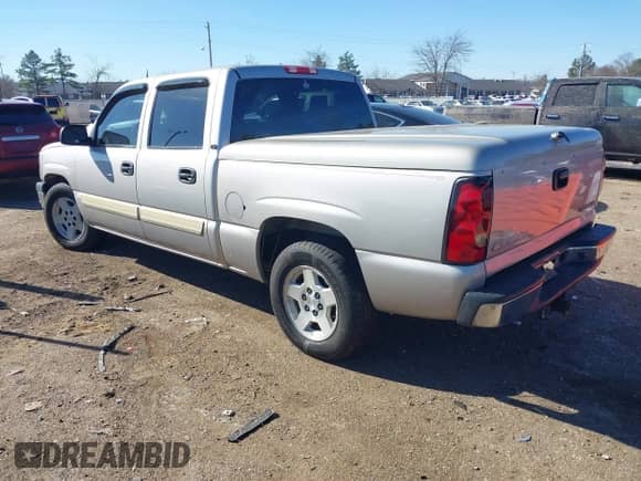 2005 Chevrolet Silverado 1500 LS z VIN 2GCEC13T651224619, wystawiony jako IAAI lot #41663773 z przebiegiem 190 453 mil mil oraz . Historia ofert i sprzedaży dostępna na DreamBid. Obrazek 3.