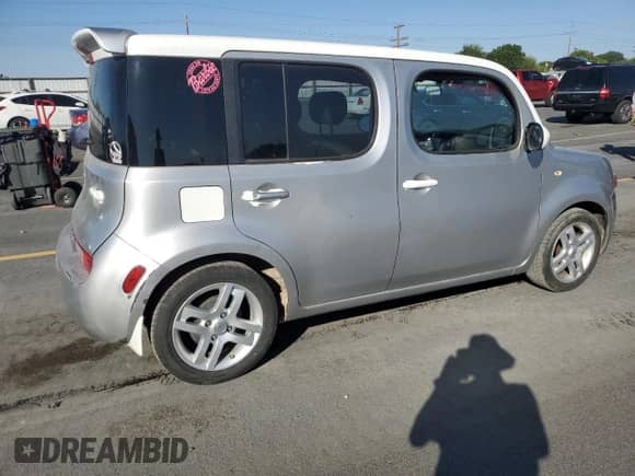 2010 Nissan Cube SL с VIN JN8AZ2KR5AT169887, выставлен на аукционе Copart как лот 63483255 с пробегом 124 706 миль миль и Списание • Salvage title. История ставок и продаж доступна на DreamBid. Изображение 3.