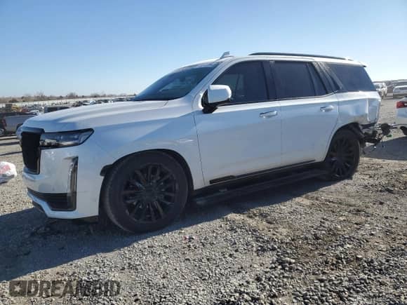 2022 Cadillac Escalade Premium Luxury с VIN 1GYS4CKL9NR154953, выставлен на аукционе Copart как лот 83537254 с пробегом 77 397 миль миль и Списание • Salvage title. История ставок и продаж доступна на DreamBid. Изображение 1.