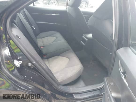 2022 Toyota Camry Hybrid LE with VIN 4T1C31AK3NU574937, listed as a IAAI auction lot 43038140 with 50,708 mi miles and . Bid and sale history available at DreamBid. Image 8.