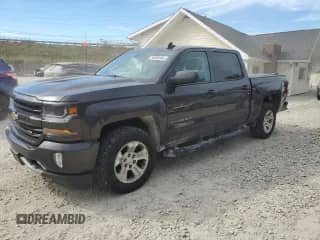 2016 Chevrolet Silverado 1500 LT z VIN 3GCUKRECXGG142641, wystawiony jako Copart lot #86588945 z przebiegiem 176 806 mil mil oraz Czysty tytuł • Clean title. Historia ofert i sprzedaży dostępna na DreamBid. Obrazek 1.