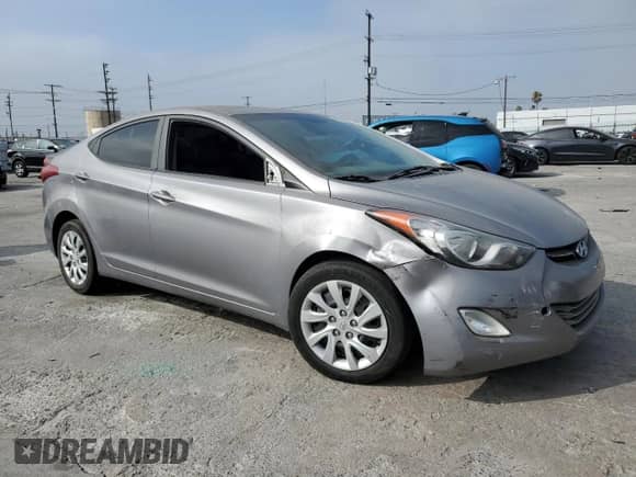 2011 Hyundai Elantra GLS with VIN KMHDH4AE0BU151004, listed as a Copart auction lot 69081305 with 184,668 mi miles and Salvage title. Bid and sale history available at DreamBid. Image 4.