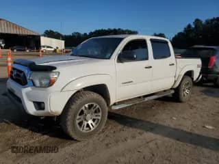 2015 Toyota Tacoma с VIN 5TFLU4EN9FX143980, выставлен на аукционе Copart как лот 85343165 с пробегом 169 908 миль миль и Списание • Salvage title. История ставок и продаж доступна на DreamBid. Изображение 1.