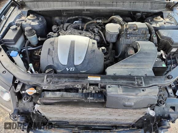 2012 Hyundai Santa Fe GLS с VIN 5XYZGDAG9CG131125, выставлен на аукционе Copart как лот 65238145 с пробегом 85 103 миль миль и На запчасти • Non repairable. История ставок и продаж доступна на DreamBid. Изображение 12.