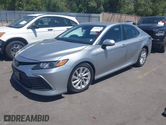 2021 Toyota Camry LE with VIN 4T1C11AK2MU538371, listed as a IAAI auction lot 42860035 with 90,662 mi miles and . Bid and sale history available at DreamBid. Image 17.