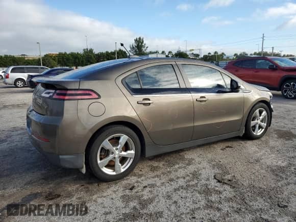 2015 Chevrolet Volt z VIN 1G1RB6E41FU126796, wystawiony jako Copart lot #75761653 z przebiegiem 75 273 mil mil oraz . Historia ofert i sprzedaży dostępna na DreamBid. Obrazek 3.