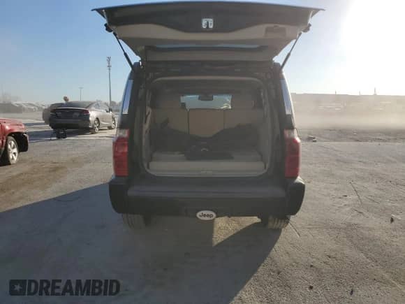 2007 Jeep Commander Overland with VIN 1J8HG68217C619277, listed as a Copart auction lot 82934414 with 136,282 mi miles and Salvage title. Bid and sale history available at DreamBid. Image 6.