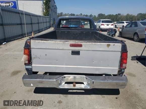 1989 Dodge Dakota S с VIN 1B7FL26X5KS067170, выставлен на аукционе Copart как лот 46698715 с пробегом 141 091 миль миль и Списание • Salvage title. История ставок и продаж доступна на DreamBid. Изображение 6.