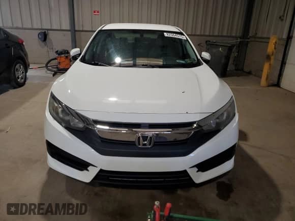 2016 Honda Civic LX with VIN 2HGFC2F59GH521998, listed as a Copart auction lot 82564575 with 94,343 mi miles and Salvage title. Bid and sale history available at DreamBid. Image 5.