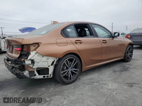 2022 BMW 3 Series 330e xDrive z VIN WBA5P9C05NFM75095, wystawiony jako Copart lot #68733985 z przebiegiem 13 462 mil mil oraz Szkoda całkowita • Salvage title. Historia ofert i sprzedaży dostępna na DreamBid. Obrazek 3.