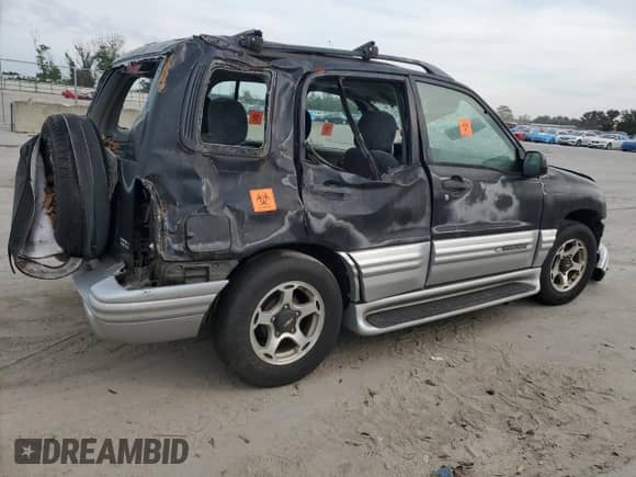 2001 Chevrolet Tracker LT с VIN 2CNBE634416919578, выставлен на аукционе Copart как лот 76677934 с пробегом Не указан миль и Списание • Salvage title. История ставок и продаж доступна на DreamBid. Изображение 3.