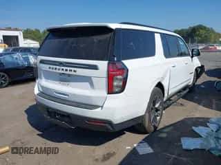 2021 Chevrolet Suburban Z71 with VIN 1GNSKDKD5MR335662, listed as a IAAI auction lot 43254959 with 94,466 mi miles and . Bid and sale history available at DreamBid. Image 4.