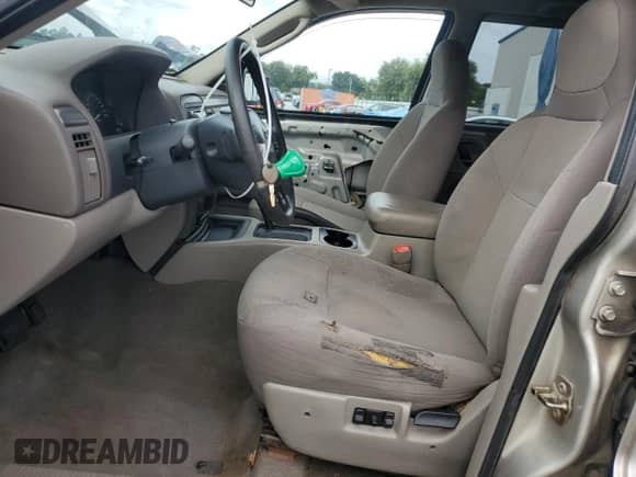 2004 Jeep Grand Cherokee Laredo with VIN 1J4GX48S04C301566, listed as a Copart auction lot 86159575 with 195,483 mi miles and Salvage title. Bid and sale history available at DreamBid. Image 7.