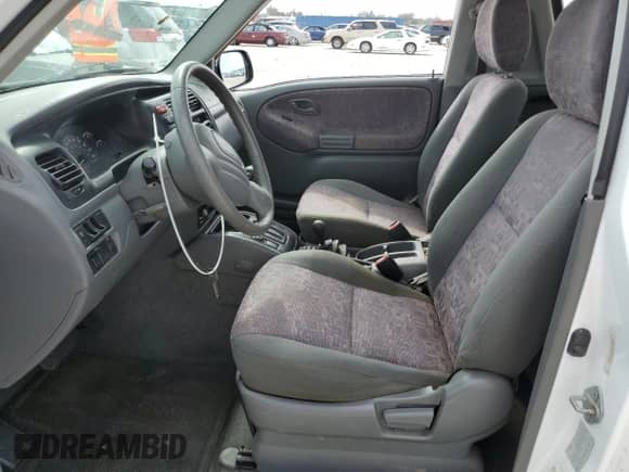 2001 Chevrolet Tracker с VIN 2CNBJ18C216900249, выставлен на аукционе Copart как лот 77476204 с пробегом Не указан миль и Списание • Salvage title. История ставок и продаж доступна на DreamBid. Изображение 7.
