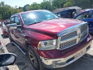 2016 Ram 1500 Laramie z VIN 1C6RR7NT2GS357047, wystawiony jako IAAI lot #43014475 z przebiegiem 242 968 mil mil oraz . Historia ofert i sprzedaży dostępna na DreamBid. Obrazek 1.