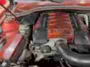 2010 Chevrolet Camaro 2SS z VIN 2G1FT1EW0A9147486, wystawiony jako Copart lot #85407795 z przebiegiem 145 629 mil mil oraz Szkoda całkowita • Salvage title. Historia ofert i sprzedaży dostępna na DreamBid. Obrazek 11.