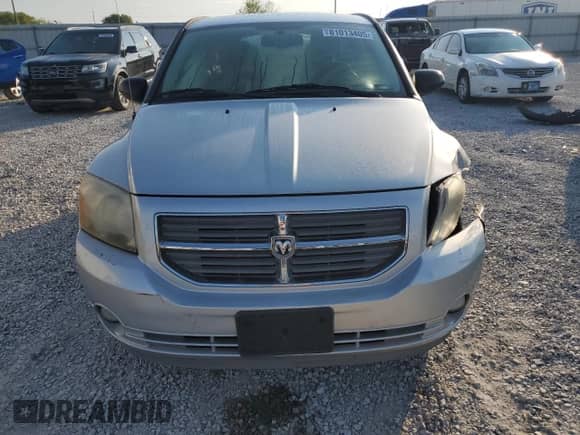 2011 Dodge Caliber Mainstreet with VIN 1B3CB3HA6BD225509, listed as a Copart auction lot 81013405 with 131,269 mi miles and Salvage title. Bid and sale history available at DreamBid. Image 5.